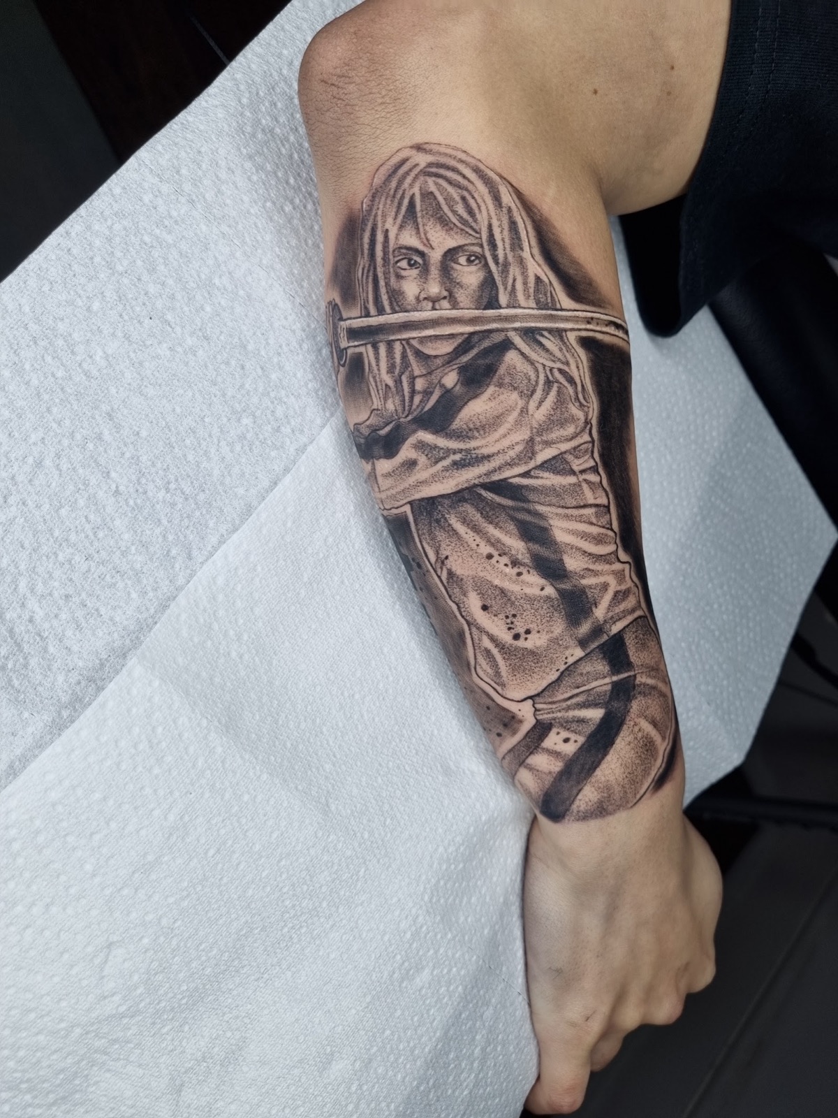 Custom designs forearm sleeve of a Norse warrior with a shield